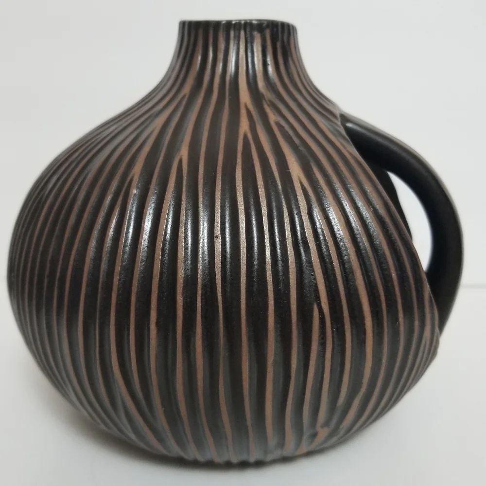 Vintage textured brown jar